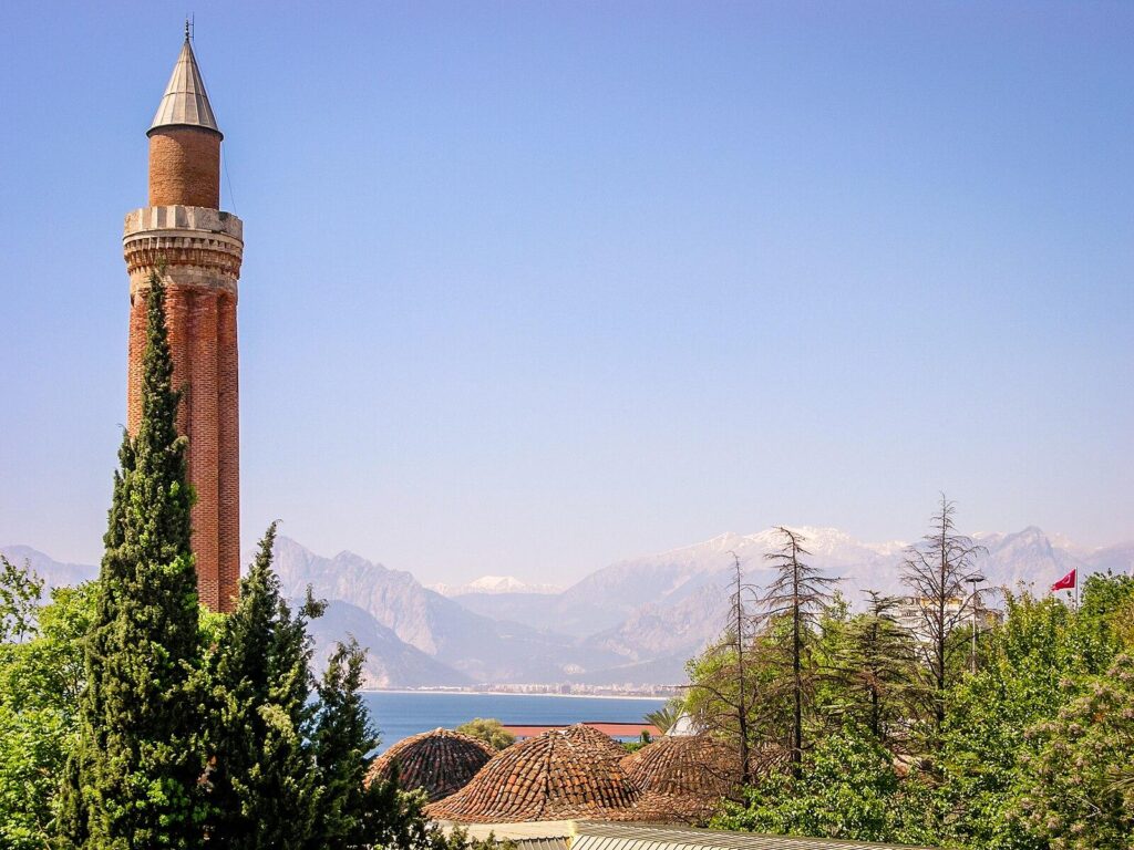 800-Year-Old Yivli Minaret and Taurus Mountains, Antalya, Turkey