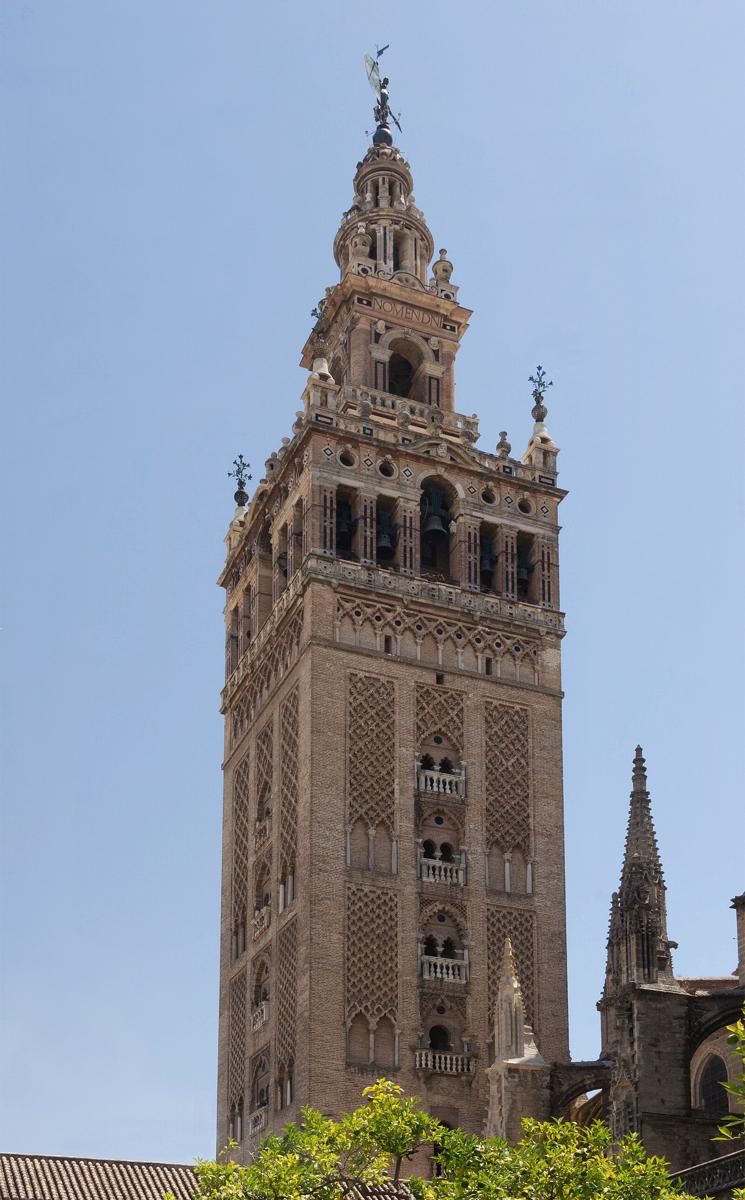 Giralda from orange trees courtyard Seville Spain